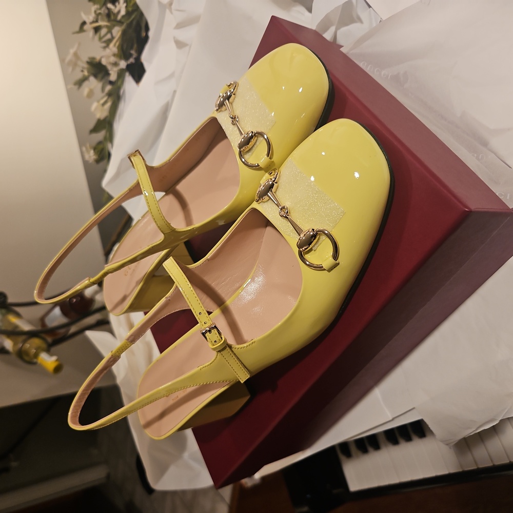 GUCCI This GUCCI That! GG Horsebit patent leather slingback pumps.